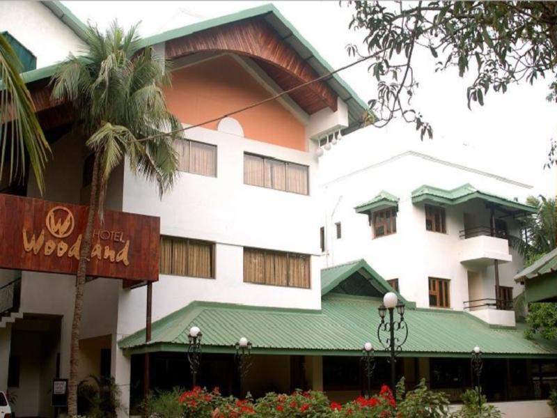 Hotel Woodland Колхапур Екстериор снимка